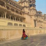 The magnificent white marble facade of the Udaipur City Palace complex overlooking Lake Pichola, a key historical site near Kumbhalgarh Fort.