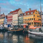 "A composite image showcasing iconic landmarks from Copenhagen, Stockholm, Tallinn, and Helsinki, representing a multi-city."