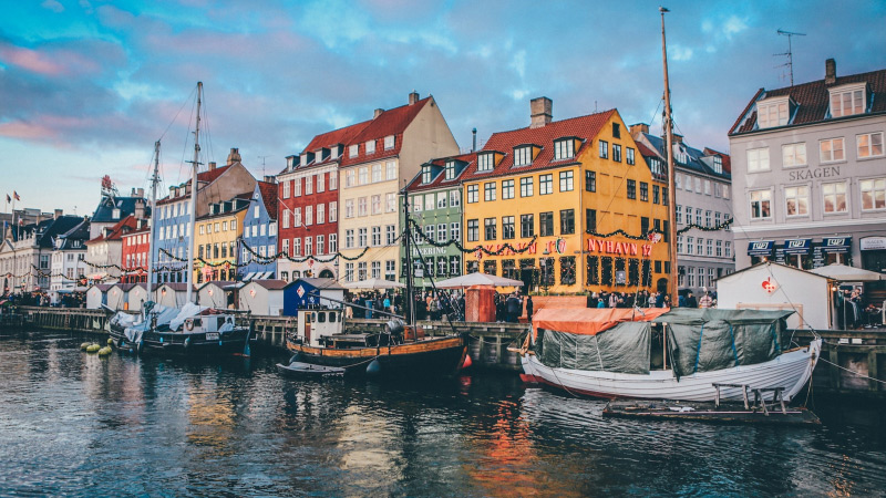"A composite image showcasing iconic landmarks from Copenhagen, Stockholm, Tallinn, and Helsinki, representing a multi-city."