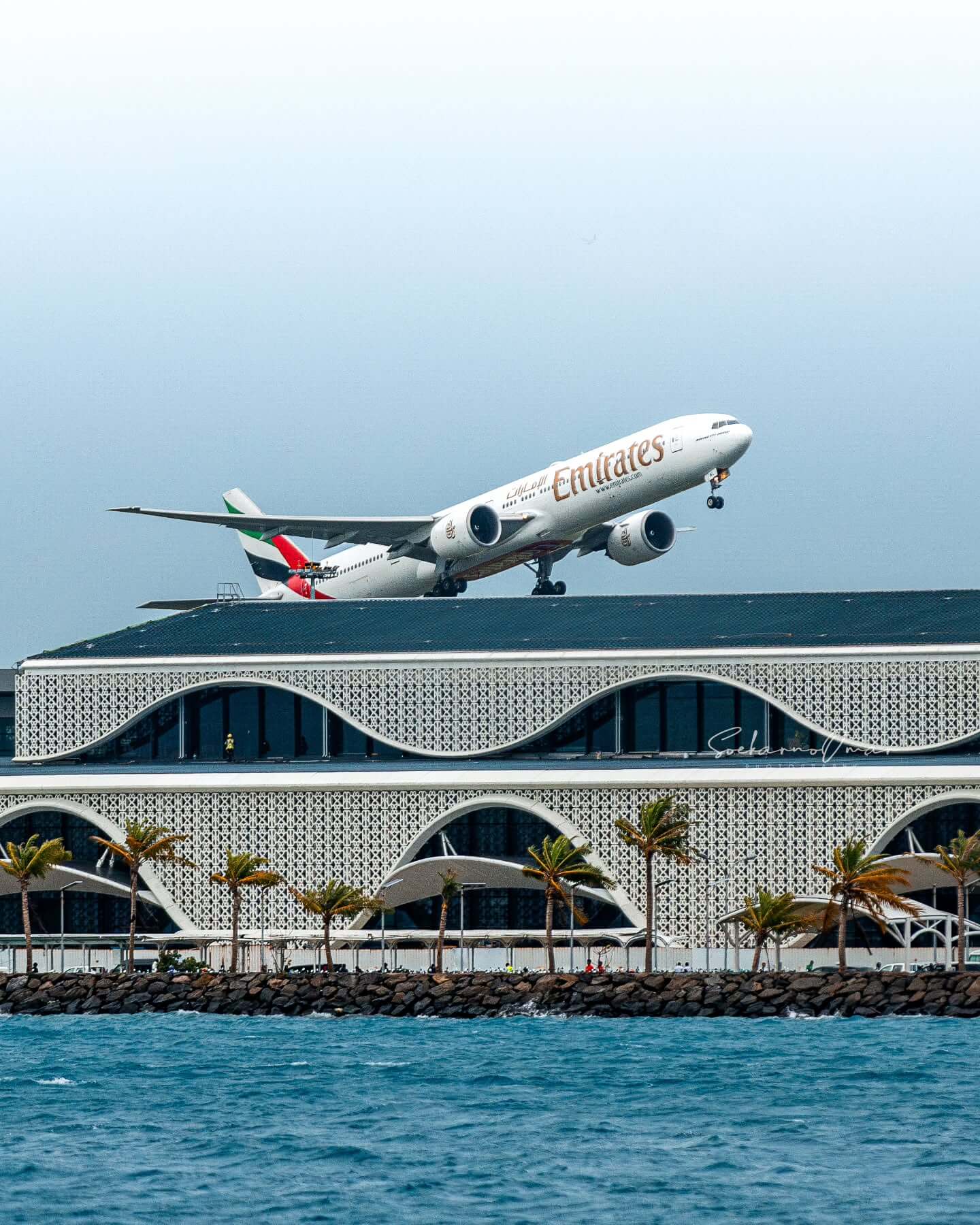 "The main international airport of the Maldives (MLE), a narrow island runway with a terminal, serving as the primary air gateway to the nation's resort islands."