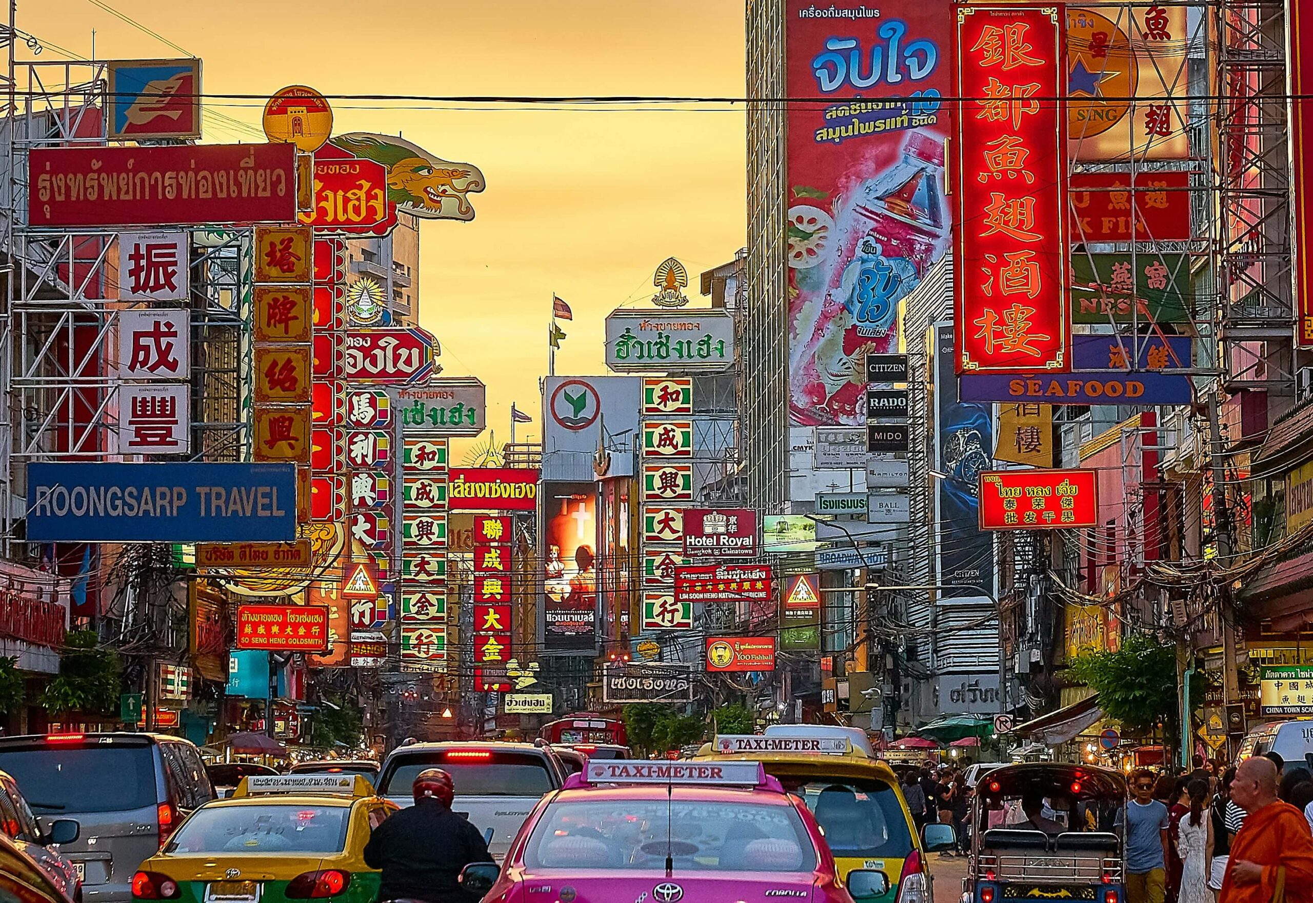 Aerial view of Bangkok city skyline showcasing temples and modern buildings – perfect for a budget Thailand trip from India