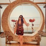 Beautiful Goa beach with golden sand, blue sea, and sunset view during a Goa trip