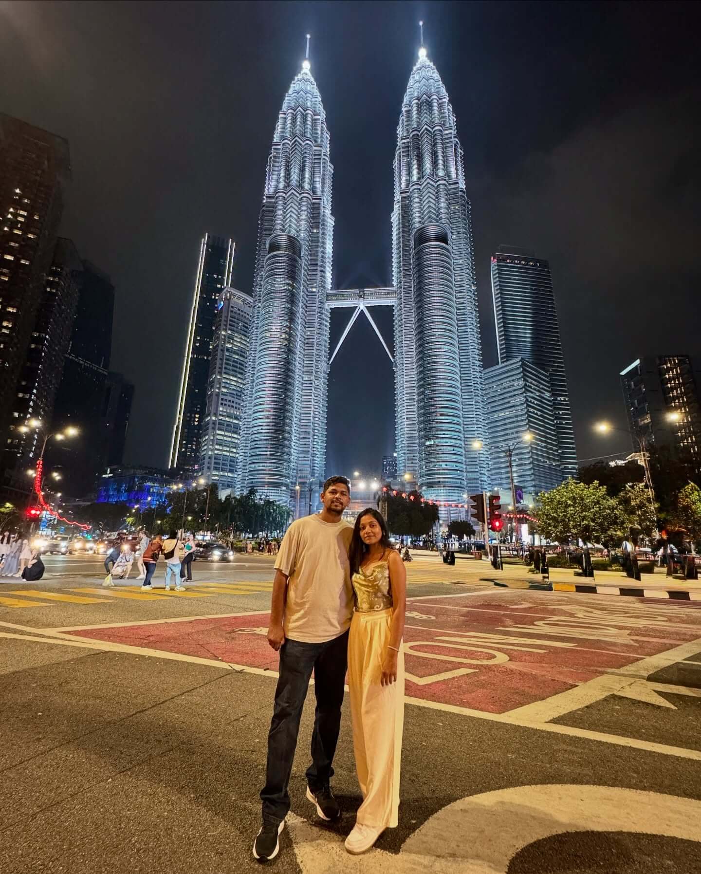 "Multiple distinct images of a Singapore city skyline, Malaysia's urban landmarks, and Langkawi's pristine beaches, combined into one, representing a multi-destination travel package."