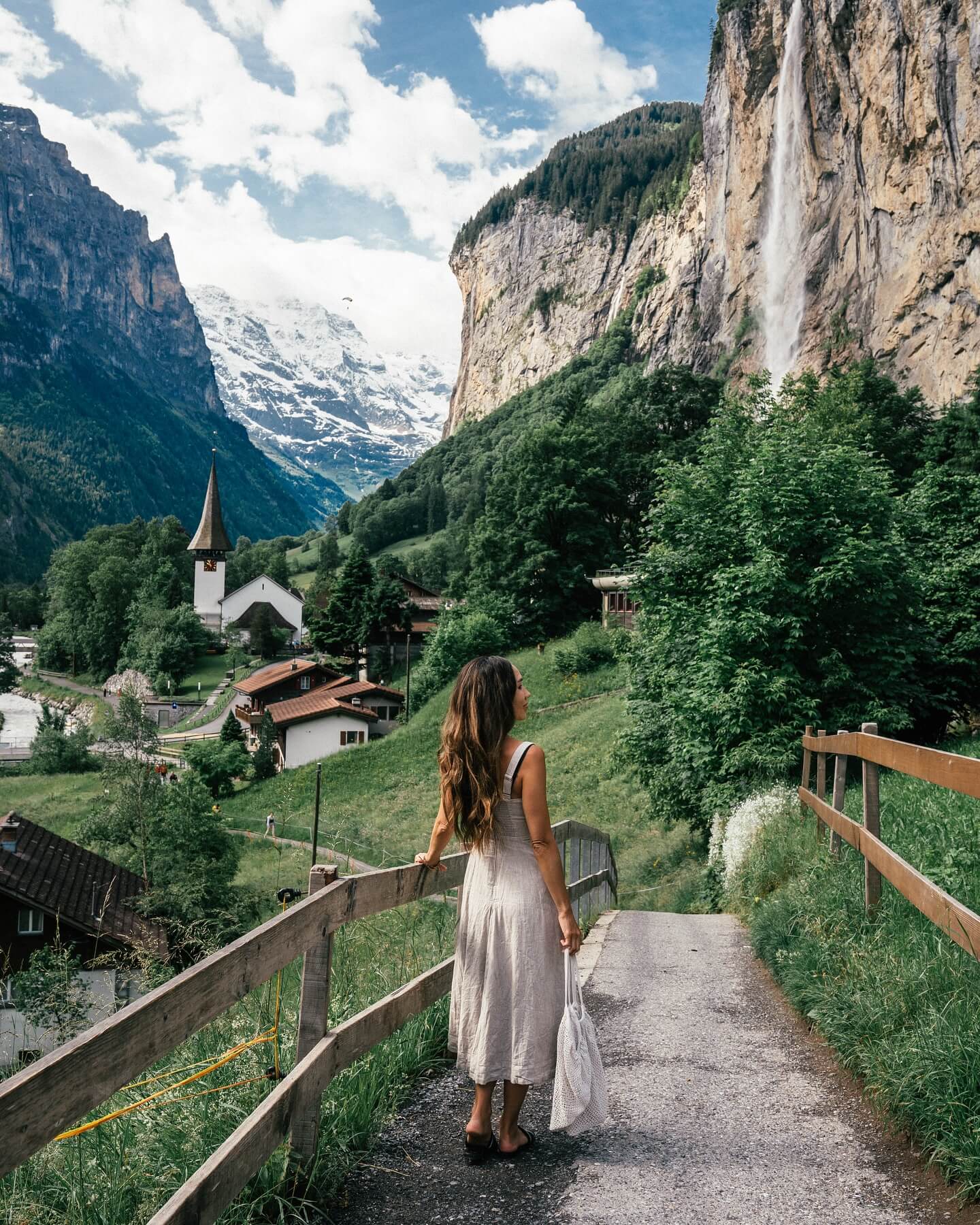 A collage of images from Switzerland, featuring the snow-capped Alps, a serene lake with a town on its shore, and a traditional Swiss village with wooden houses.