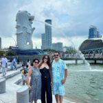 Romantic sunset view of Singapore skyline at Marina Bay for honeymoon couples