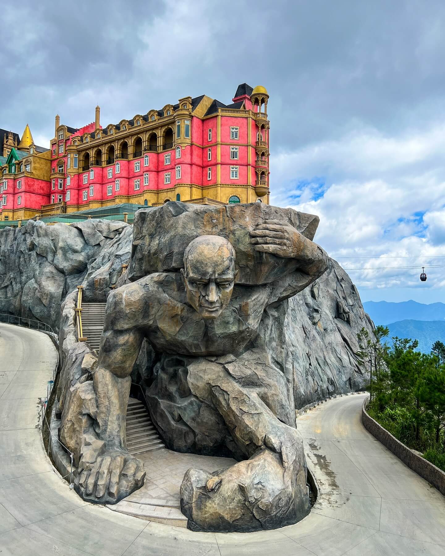 Ba Na Hills Golden Bridge in Da Nang Vietnam with mountain views and cable cars