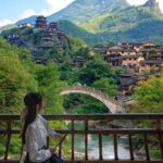 China travel guide featuring the Great Wall of China, Beijing skyline, Shanghai cityscape, visa tips for Indians, and travel planning information for a China tour package from India.