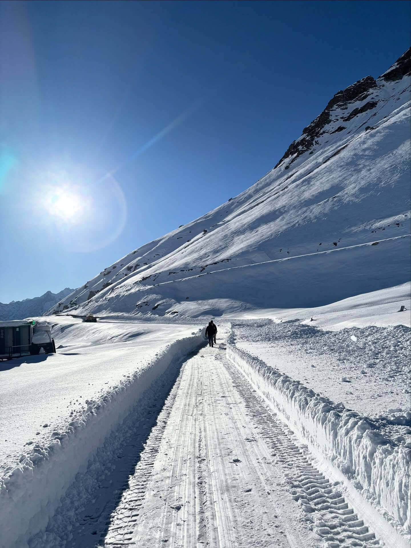 Rohtang Pass snow-covered mountains in Himachal Pradesh during summer with scenic road views