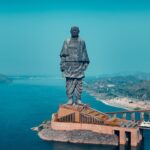 Statue of Unity in Gujarat standing beside the Narmada River with scenic landscape view